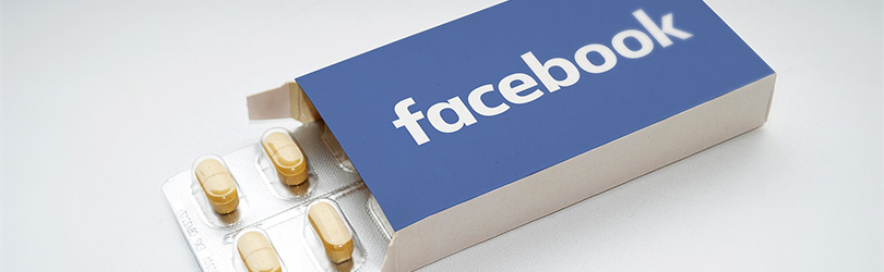 a photo of a box of pills with the facebook logo on it