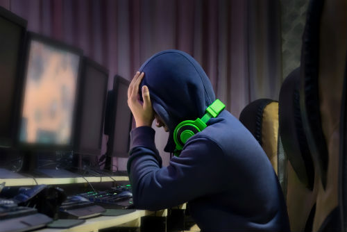 a-photo-of-a-young-gamer-in-front-of-a-computer