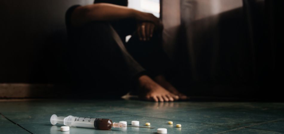 young man suffring drug addiction